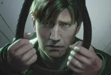 James Sunderland pulls at his hair in a tense close-up in Silent Hill 2