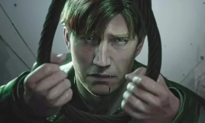 James Sunderland pulls at his hair in a tense close-up in Silent Hill 2