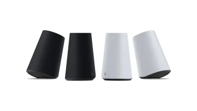 Four Sony Pulse Elevate wireless speakers, shown in two black and two white finishes against a white background