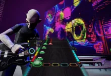 Stage Tour gameplay showing a guitarist playing along with a colorful note track.