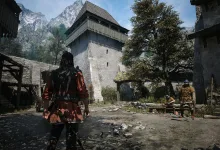 The Blood of Dawnwalker screenshot showing a character in a medieval settlement beneath towering mountains