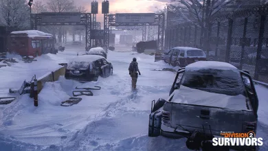 A Division 2 agent walks through a snow-covered Washington, D.C. street surrounded by abandoned vehicles.