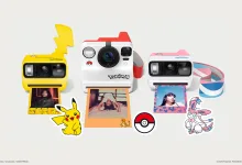 Three Pokémon-themed Polaroid cameras displayed with Pokémon accessories, including Pikachu and Sylveon designs and a Poké Ball
