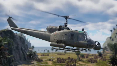 A UH-1C helicopter flies over a tropical landscape in War Thunder.