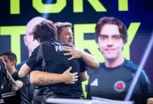 VALORANT esports players embracing during a competitive match