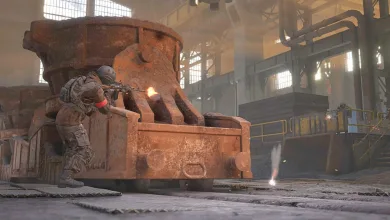 A Wardogs soldier fires from cover beside industrial machinery inside a factory.