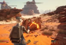 A character standing in a rocky desert in Dune: Awakening