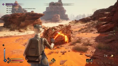 A character standing in a rocky desert in Dune: Awakening