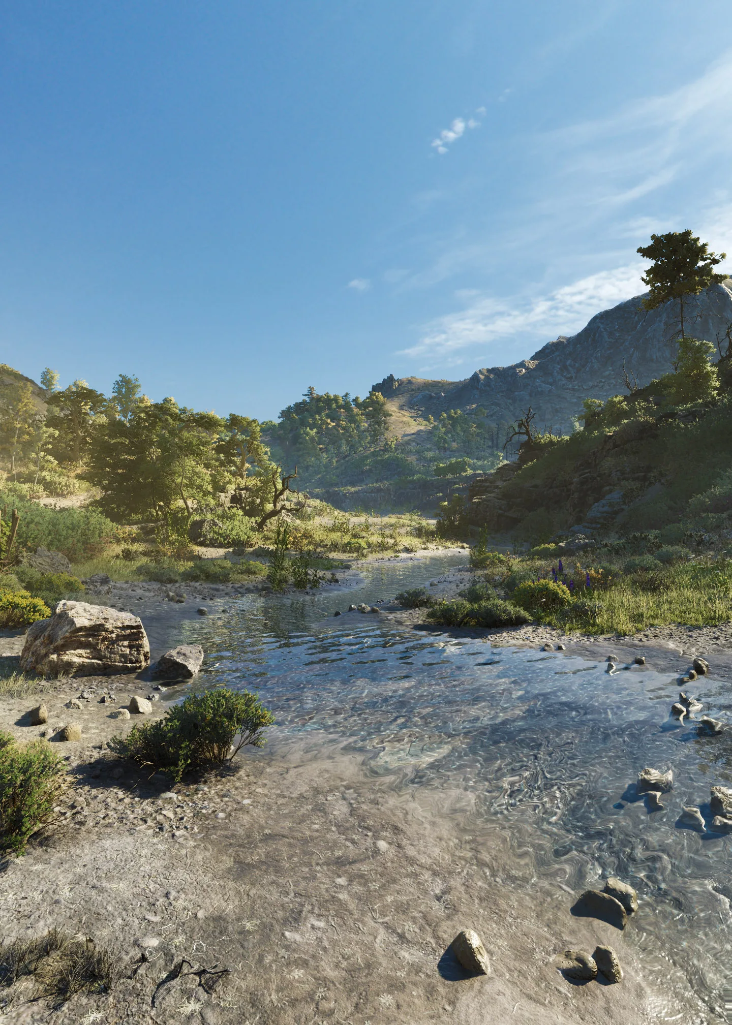 A sunlit stream running through a mountainous Valle Dorata landscape