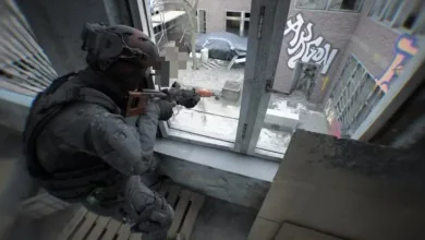 A heavily equipped Bodycam player aims a rifle through a broken window toward a city street.