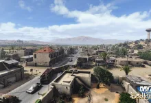 A wide view of Nasdara in DayZ Badlands shows a desert city, roads, and surrounding mountains.