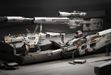 Several futuristic Delta Force firearms arranged on display against a dark background.