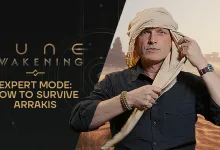 A survival expert adjusts a desert head covering beside the Dune: Awakening title and an Arrakis landscape.