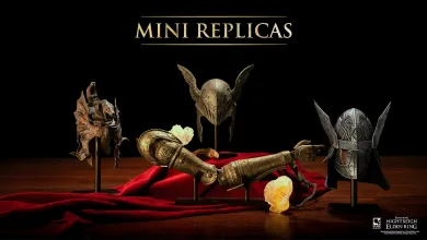 Four Elden Ring display replicas arranged on a red cloth, including Malenia's prosthetic arm and helmets for Malenia, Messmer and Wylder