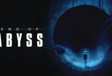 A small figure stands before a massive circular opening in a dark blue underground setting.