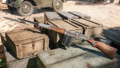 The ZH-32 rifle rests across wooden crates in an Enlisted scene.
