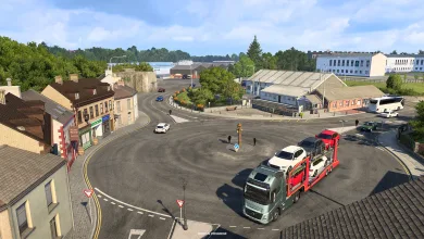 A Euro Truck Simulator 2 truck navigates a roundabout among buildings in Cavan.