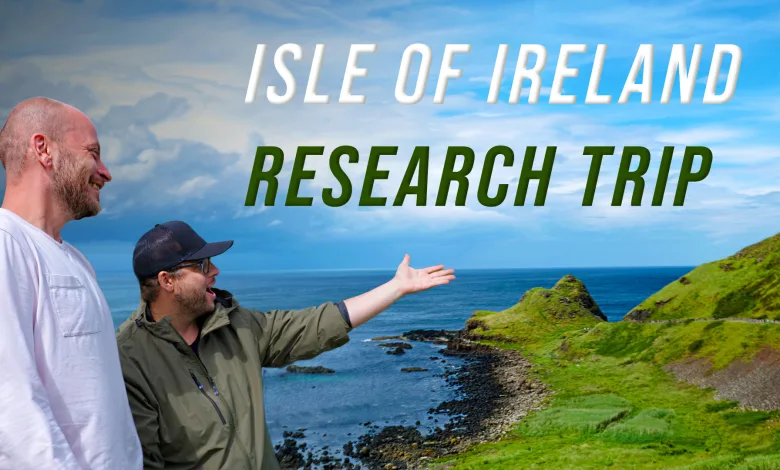 Two SCS On The Road team members stand beside the Irish coast during the Isle of Ireland research trip.