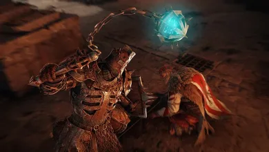 Xaphan swings a chained flail with a glowing blue head at Hulda during their fight in For Honor