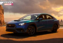 A blue 2022 Subaru WRX on a sandy coastline in Forza Horizon 5