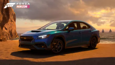 A blue 2022 Subaru WRX on a sandy coastline in Forza Horizon 5