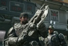 A Gears of War: E-Day soldier holds a Lancer while another COG soldier stands behind him