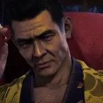 Genzo Iwaki seated in a red chair