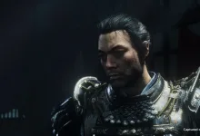 Jin Sakai stands in shadowy samurai armor with his sword visible in Ghost of Yōtei's Most Wanted mode.
