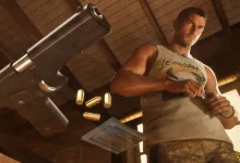 A Grand Theft Auto VI character stands beneath a handgun with ammunition visible in a warmly lit room.