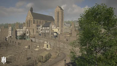 Hell Let Loose gameplay showing a village street, church, stone buildings, and trees