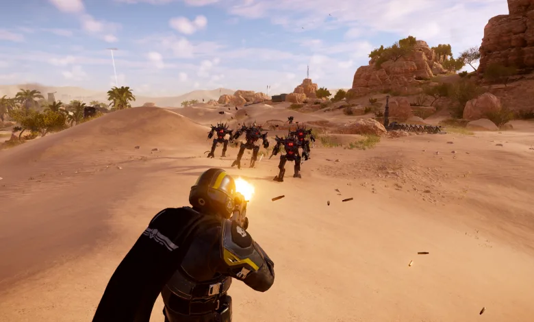 A Helldivers 2 soldier fires at enemies across a desert battlefield.