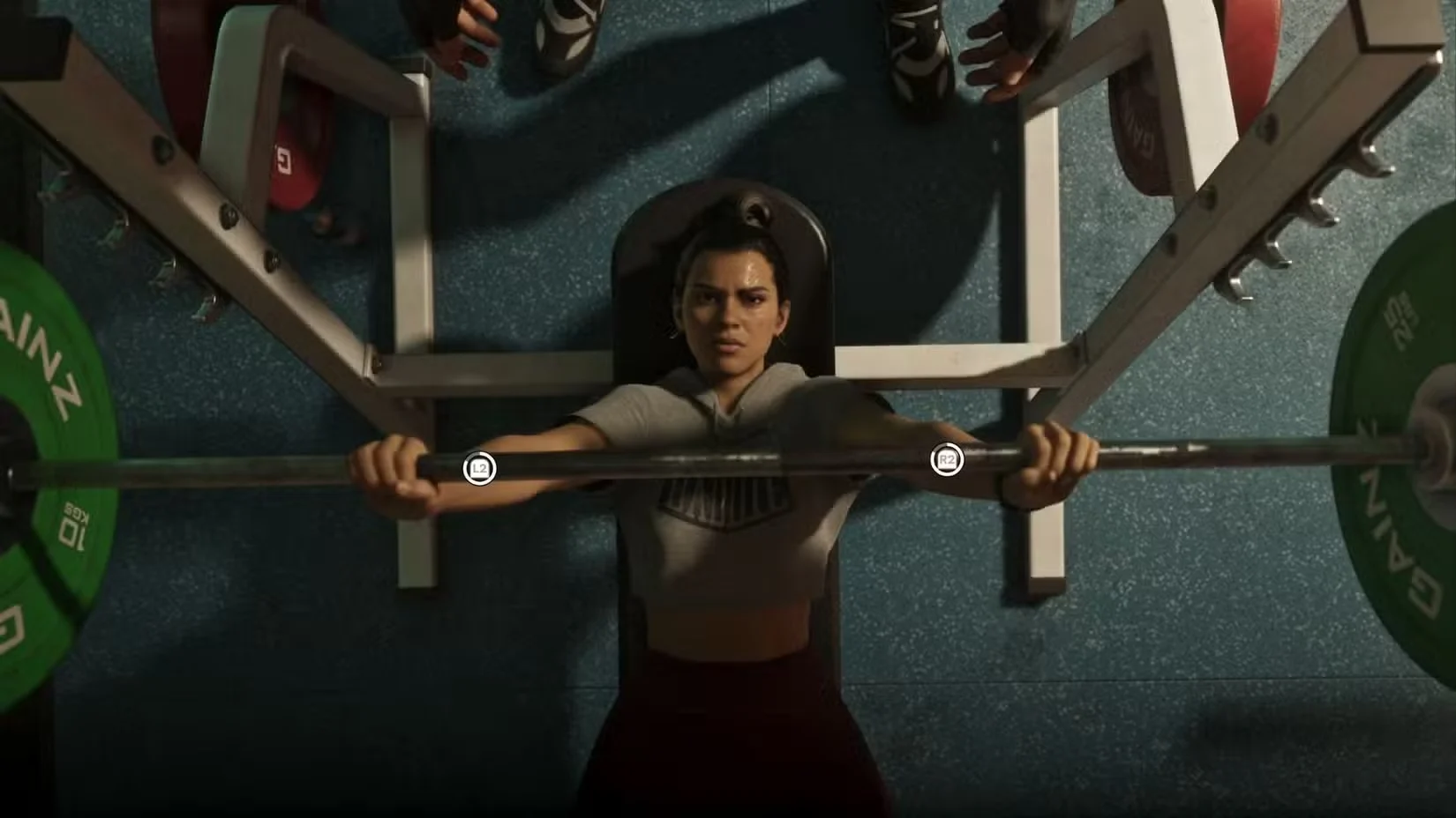 Lucia performs a bench press in a gym
