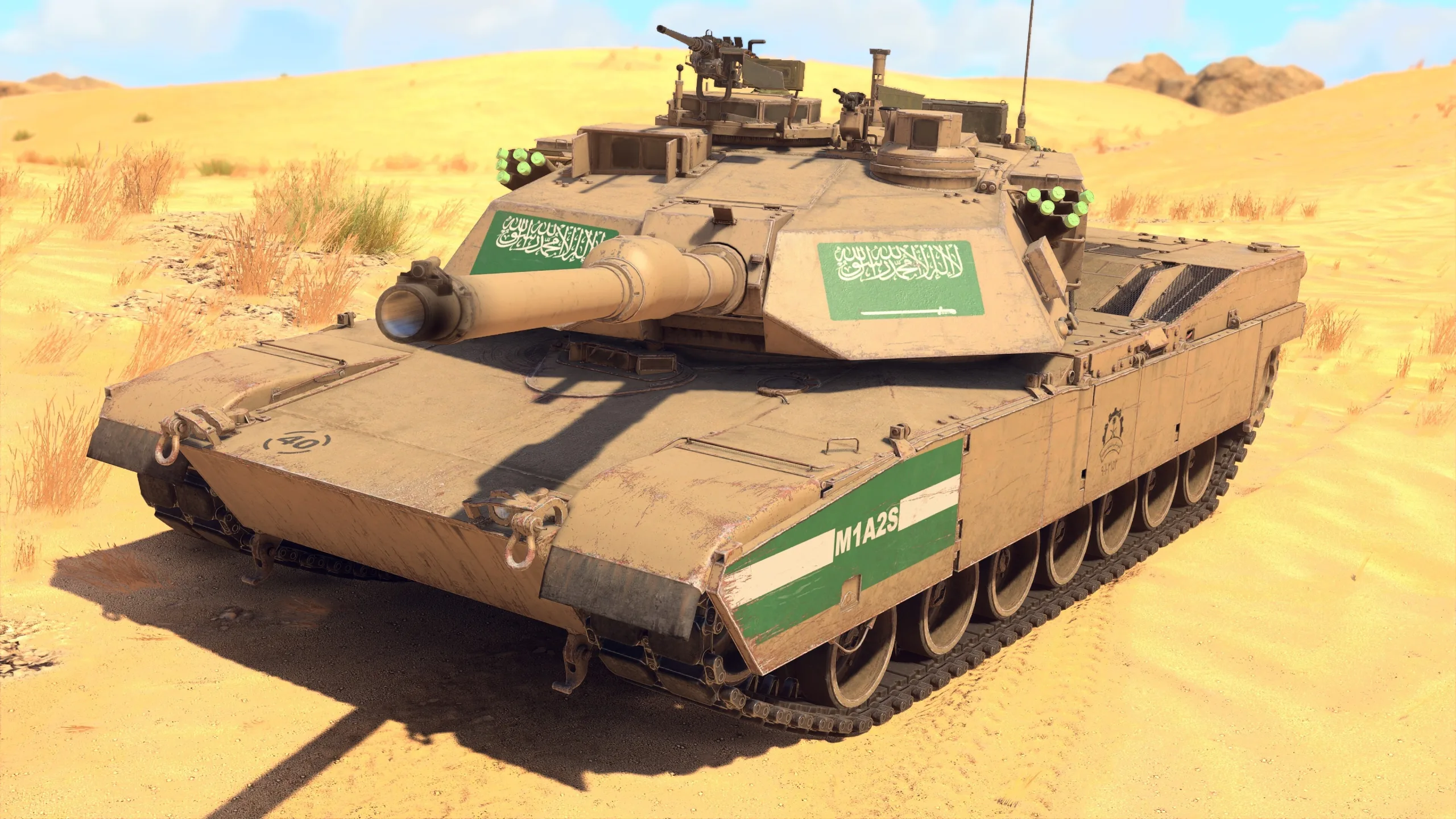 M1A2 Abrams tank with Saudi flags in a desert environment
