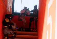 A Marathon crew moves through a red industrial corridor with weapons ready