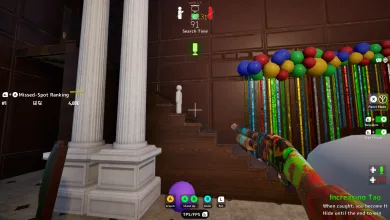 First-person Meccha Chameleon gameplay in a room with white columns, colorful hanging decorations, and a green voice chat microphone indicator in the HUD.