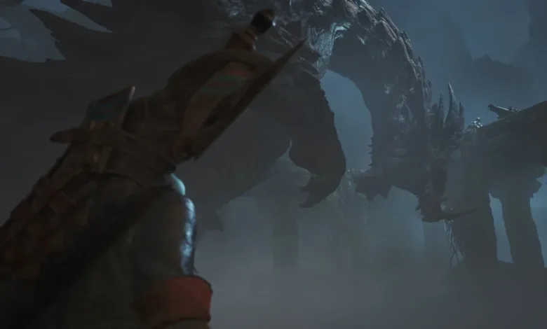 A hunter faces a massive silhouetted monster beneath a rocky arch in Monster Hunter Wilds: Ascendance