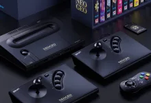 Neo Geo AES+ console surrounded by arcade sticks, a gamepad, and Neo Geo game cartridges