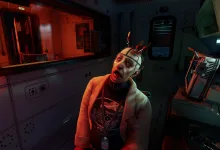 A person with probes attached to their head sits amid laboratory equipment in ONTOS