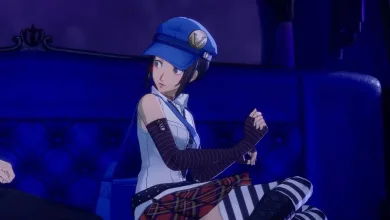 Marie sits on a couch wearing a blue cap, striped sleeves, and a plaid skirt in Persona 4 Revival.