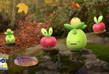 Applin appear among fallen leaves and mossy rocks in an autumn forest scene