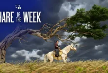 A rider on a white horse passes beneath a windswept tree in a grassy field under dark storm clouds.