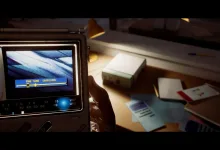 A first-person view shows a hand holding the CRTV handheld device over a desk in Silent Hill: Townfall