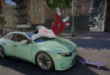A skate. player falls onto the hood of a green car during a failed skateboard trick.