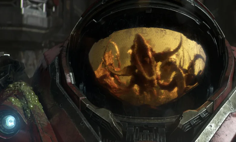 A red StarCraft mech helmet reflects an alien figure in its visor.