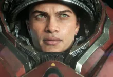 A man in a red mech suit shown in the StarCraft 2030 open-world shooter trailer.