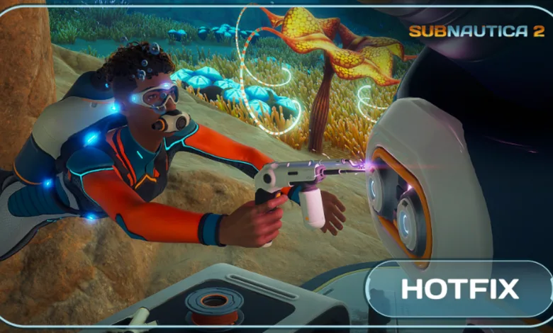 Subnautica 2 players use equipment underwater beside a large creature during the Buddy System Hotfix