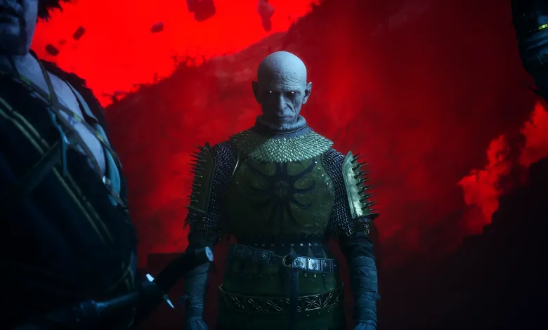 A bald vampire stands in dark armor against a vivid red sky in The Blood of Dawnwalker
