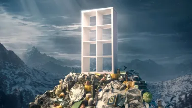 A white cubby shelf stands on a pile of loot against a snowy mountain landscape in The Elder Scrolls V: Skyrim.