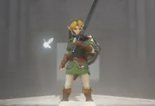 Link stands in a gray chamber holding a sword with a glowing fairy beside him in The Legend of Zelda: Ocarina of Time Remake.