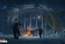 Two armed agents approach a lit structure through a snow-covered settlement in Tom Clancy's The Division 2: Survivors.